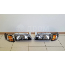 Фара Toyota Corolla 97-02 черный хрусталь, комплект (2 фары + 2 поворота), стекло, не пластик Фара Toyota Corolla 97-02 черный хрусталь, комплект (2 фары + 2 поворота), стекло, не пластик